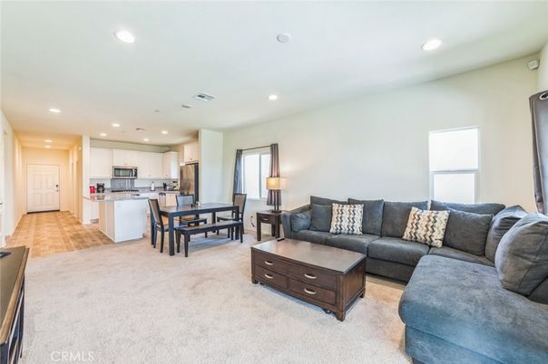 Dining room, Interior, Kitchen, Living room, Recessed Lighting, Stainless Steel Appliances, Wood Texture Flooring