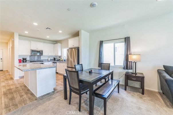 Dining room, Interior, Kitchen, Recessed Lighting, Stainless Steel Appliances, Wood Texture Flooring