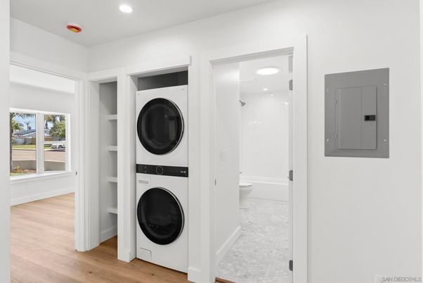 Bathroom, Interior, Recessed Lighting, Utility Closets, Washer, Wood Texture Flooring