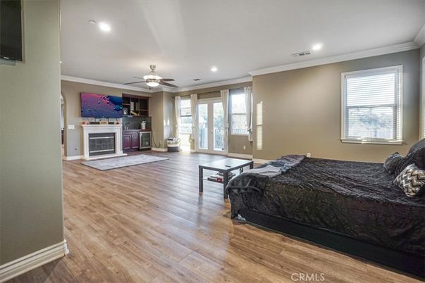 Bedroom, Fireplace, Interior, Recessed Lighting, Wood Texture Flooring
