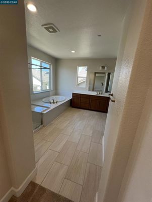 Bathroom, Dual Sink Vanities, Interior, Recessed Lighting, Wood Texture Flooring
