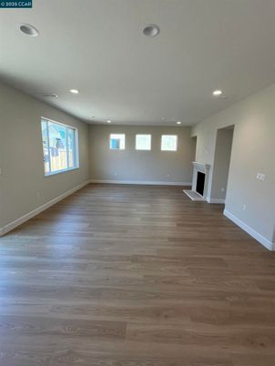 Empty room, Fireplace, Interior, Recessed Lighting, Wood Texture Flooring