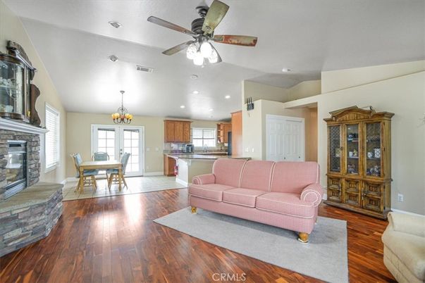 Chandelier, Dining room, Fireplace, Interior, Kitchen, Living room, Recessed Lighting, Wood Texture Flooring