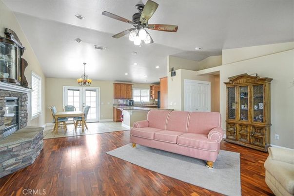 Chandelier, Dining room, Fireplace, Interior, Kitchen, Living room, Recessed Lighting, Wood Texture Flooring