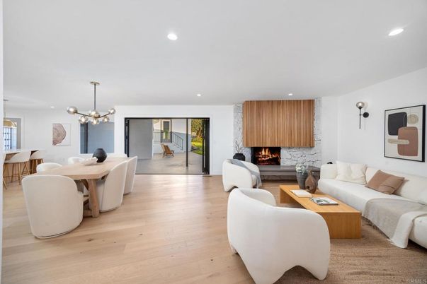 Dining room, Fireplace, Interior, Living room, Pendant Lights, Recessed Lighting, Wood Texture Flooring