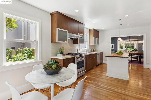 Dining room, Interior, Kitchen, Pendant Lights, Recessed Lighting, Stainless Steel Appliances, Wood Texture Flooring