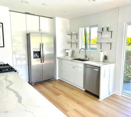 Interior, Kitchen, Recessed Lighting, Stainless Steel Appliances, Wood Texture Flooring