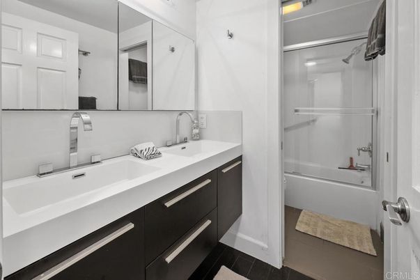 Bathroom, Dual Sink Vanities, Glass Shower, Interior, Wood Texture Flooring