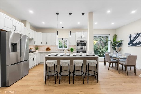 Dining room, Interior, Kitchen, Pendant Lights, Recessed Lighting, Stainless Steel Appliances, Wood Texture Flooring