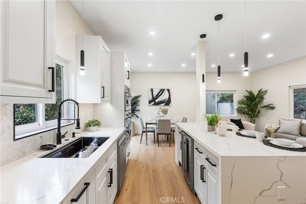 Dining room, Interior, Kitchen, Pendant Lights, Recessed Lighting, Stainless Steel Appliances, Wood Texture Flooring