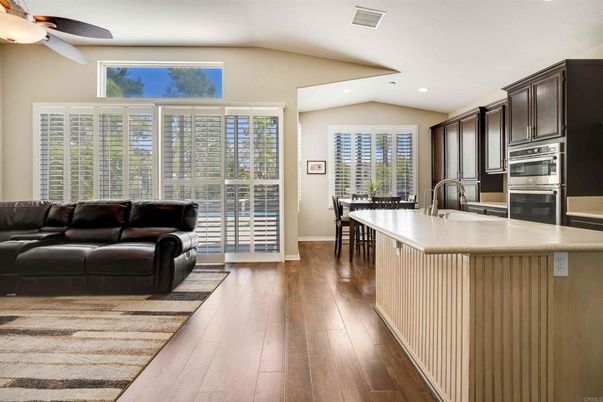 Dining room, Interior, Kitchen, Living room, Recessed Lighting, Stainless Steel Appliances, Wood Texture Flooring