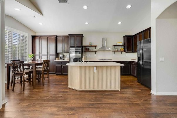 Dining room, Interior, Kitchen, Recessed Lighting, Stainless Steel Appliances, Wood Texture Flooring