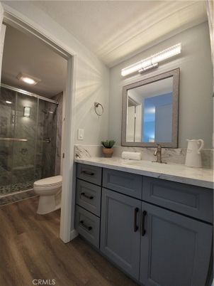 Bathroom, Glass Shower, Interior, Recessed Lighting, Wood Texture Flooring