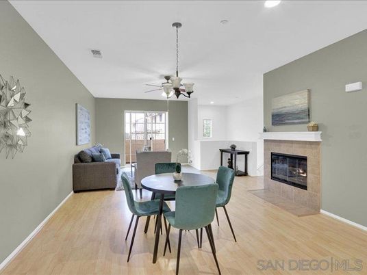 Dining room, Fireplace, Interior, Living room, Recessed Lighting, Wood Texture Flooring