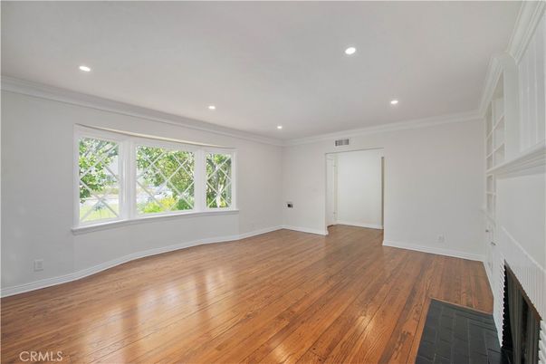Empty room, Fireplace, Interior, Recessed Lighting, Wood Texture Flooring