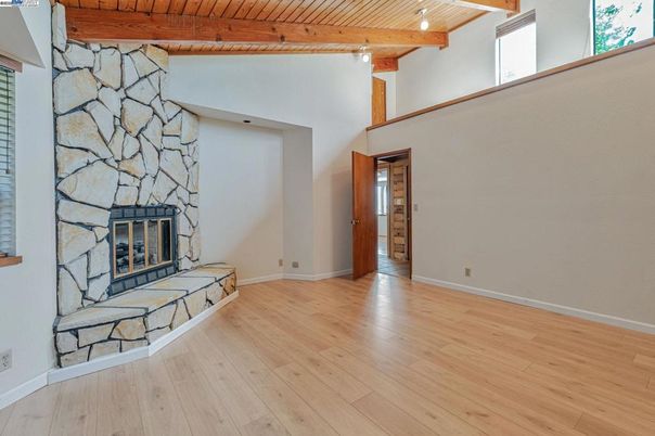 Empty room, Fireplace, Interior, Stone Walls, Wooden Beams, Wooden Ceilings, Wood Texture Flooring