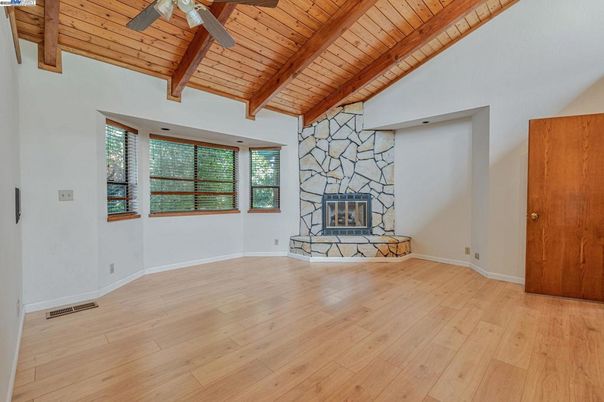 Empty room, Fireplace, Interior, Stone Walls, Wooden Beams, Wooden Ceilings, Wood Texture Flooring