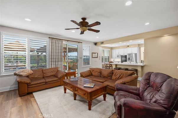 Dining room, Interior, Kitchen, Living room, Recessed Lighting, Stainless Steel Appliances, Wood Texture Flooring