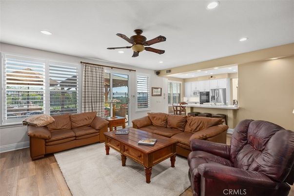 Dining room, Interior, Kitchen, Living room, Recessed Lighting, Stainless Steel Appliances, Wood Texture Flooring