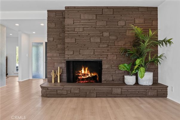 Fireplace, Interior, Recessed Lighting, Stone Walls, Wood Texture Flooring