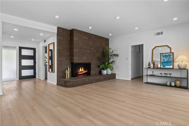 Fireplace, Interior, Recessed Lighting, Stone Walls, Wood Texture Flooring