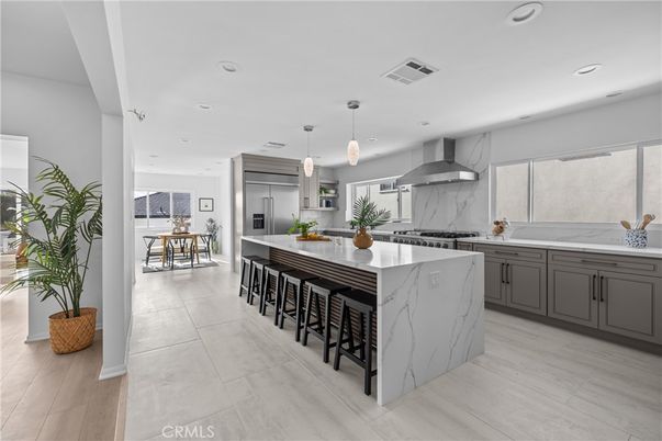 Dining room, Interior, Kitchen, Marble Walls, Pendant Lights, Recessed Lighting, Stainless Steel Appliances