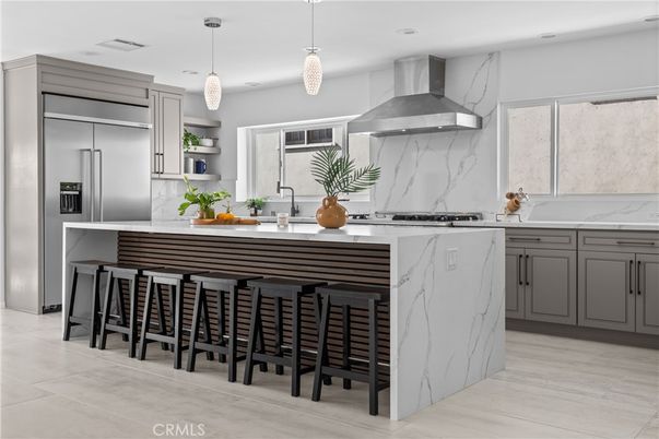 Interior, Kitchen, Marble Walls, Pendant Lights, Recessed Lighting, Stainless Steel Appliances, Wood Texture Flooring