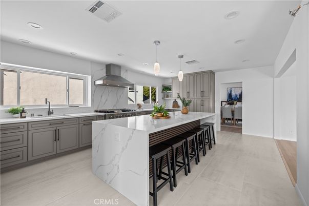 Interior, Kitchen, Marble Walls, Pendant Lights, Recessed Lighting, Stainless Steel Appliances