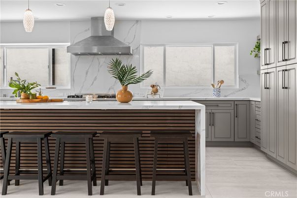 Interior, Kitchen, Marble Walls, Pendant Lights, Recessed Lighting, Stainless Steel Appliances