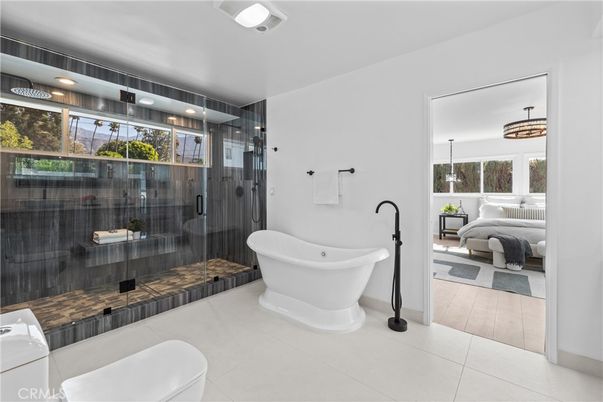 Bathroom, Bedroom, Free Standing Baths, Glass Shower, Interior, Pendant Lights, Recessed Lighting, Wood Texture Flooring