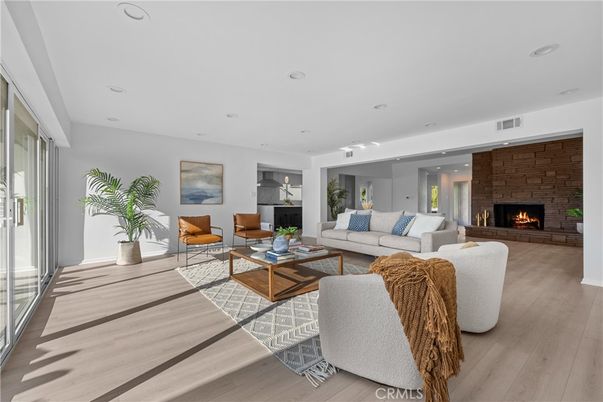 Fireplace, Interior, Living room, Recessed Lighting, Stone Walls, Wood Texture Flooring