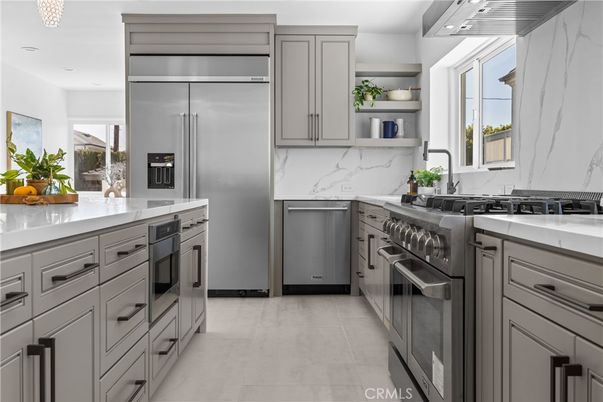 Interior, Kitchen, Marble Walls, Recessed Lighting, Stainless Steel Appliances