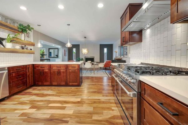 Dining room, Interior, Kitchen, Living room, Pendant Lights, Recessed Lighting, Stainless Steel Appliances, Wood Texture Flooring