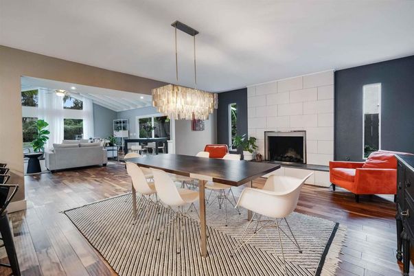 Chandelier, Dining room, Fireplace, Interior, Living room, Recessed Lighting, Stone Walls, Wood Texture Flooring