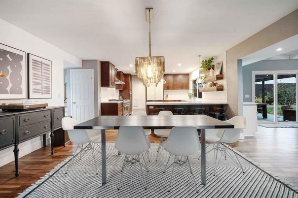 Chandelier, Dining room, Interior, Kitchen, Pendant Lights, Recessed Lighting, Stainless Steel Appliances, Wood Texture Flooring
