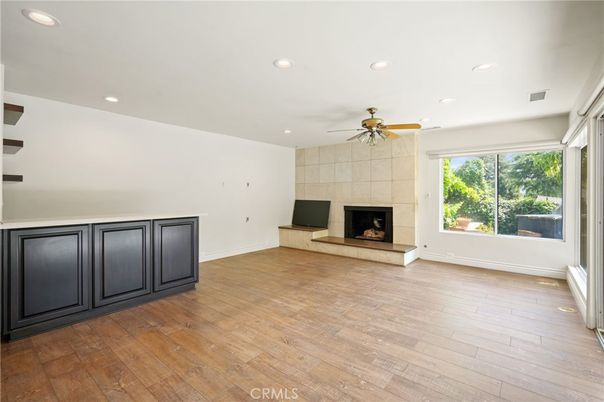 Empty room, Fireplace, Interior, Recessed Lighting, Wood Texture Flooring