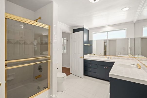 Bathroom, Dual Sink Vanities, Glass Shower, Interior, Recessed Lighting, Tile Countertops