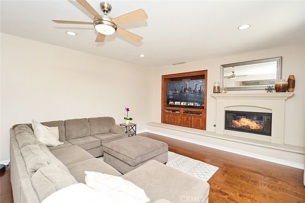 Fireplace, Interior, Living room, Recessed Lighting, Wood Texture Flooring