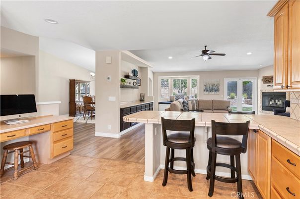 Fireplace, Interior, Kitchen, Living room, Recessed Lighting, Tile Countertops, Wood Texture Flooring