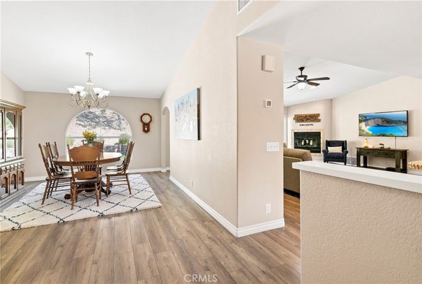 Chandelier, Dining room, Fireplace, Interior, Wood Texture Flooring