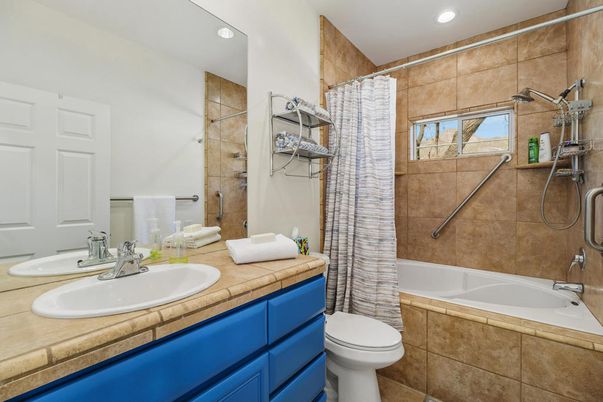 Bathroom, Dual Sink Vanities, Interior, Recessed Lighting, Tile Countertops