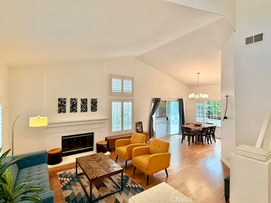 Chandelier, Dining room, Fireplace, Interior, Living room, Wood Texture Flooring
