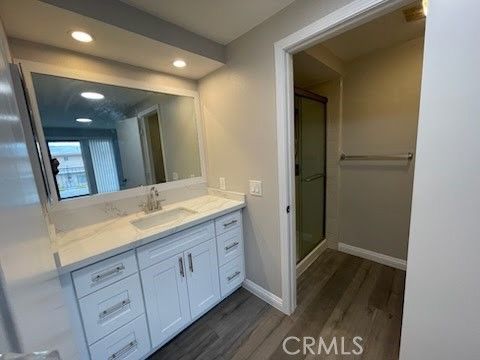 Bathroom, Dual Sink Vanities, Interior, Recessed Lighting, Wood Texture Flooring