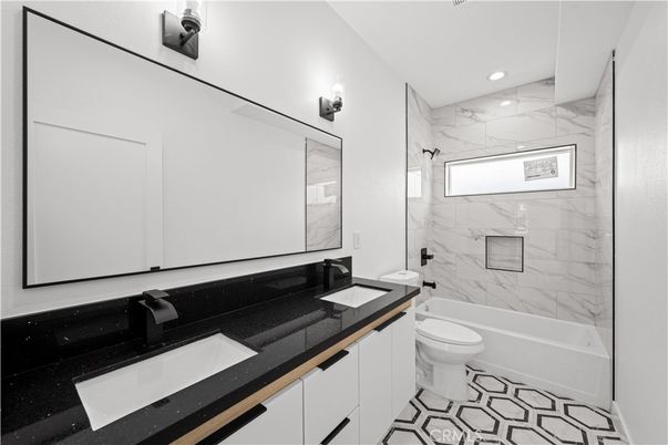 Bathroom, Dual Sink Vanities, Interior, Marble Walls, Recessed Lighting
