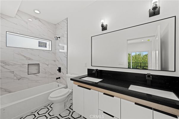 Bathroom, Dual Sink Vanities, Interior, Marble Walls, Recessed Lighting