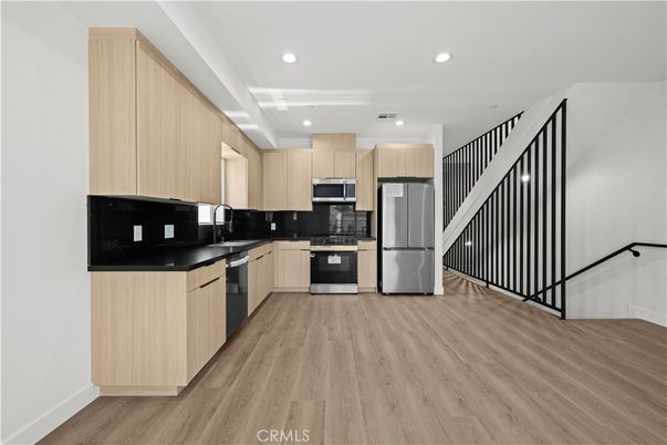 Interior, Kitchen, Recessed Lighting, Stainless Steel Appliances, Wood Texture Flooring