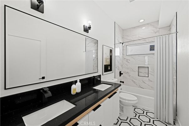 Bathroom, Dual Sink Vanities, Interior, Marble Walls, Recessed Lighting