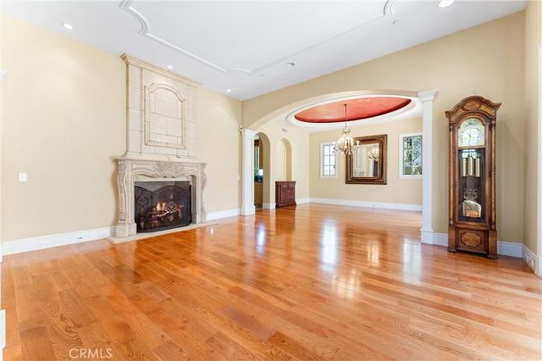 Chandelier, Empty room, Fireplace, Interior, Recessed Lighting, Wood Texture Flooring