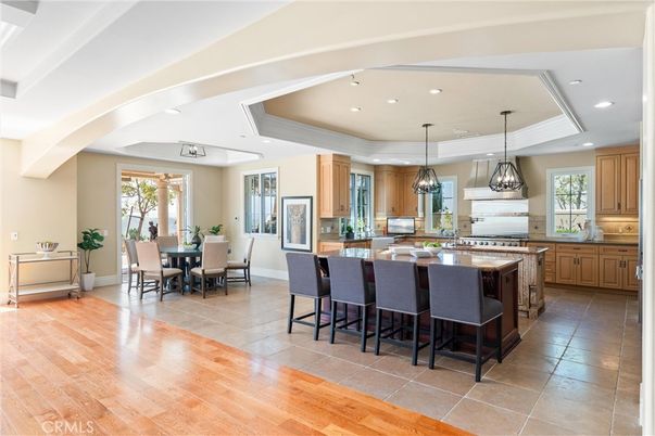 Dining room, Interior, Kitchen, Pendant Lights, Recessed Lighting, Stainless Steel Appliances, Wood Texture Flooring