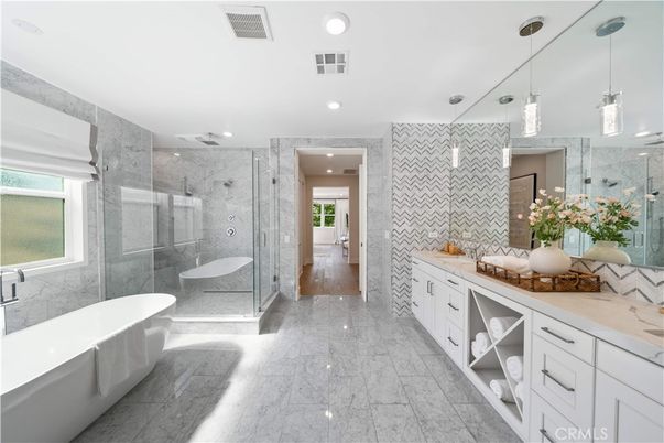Bathroom, Dual Sink Vanities, Free Standing Baths, Glass Shower, Interior, Marble, Marble Walls, Pendant Lights, Recessed Lighting